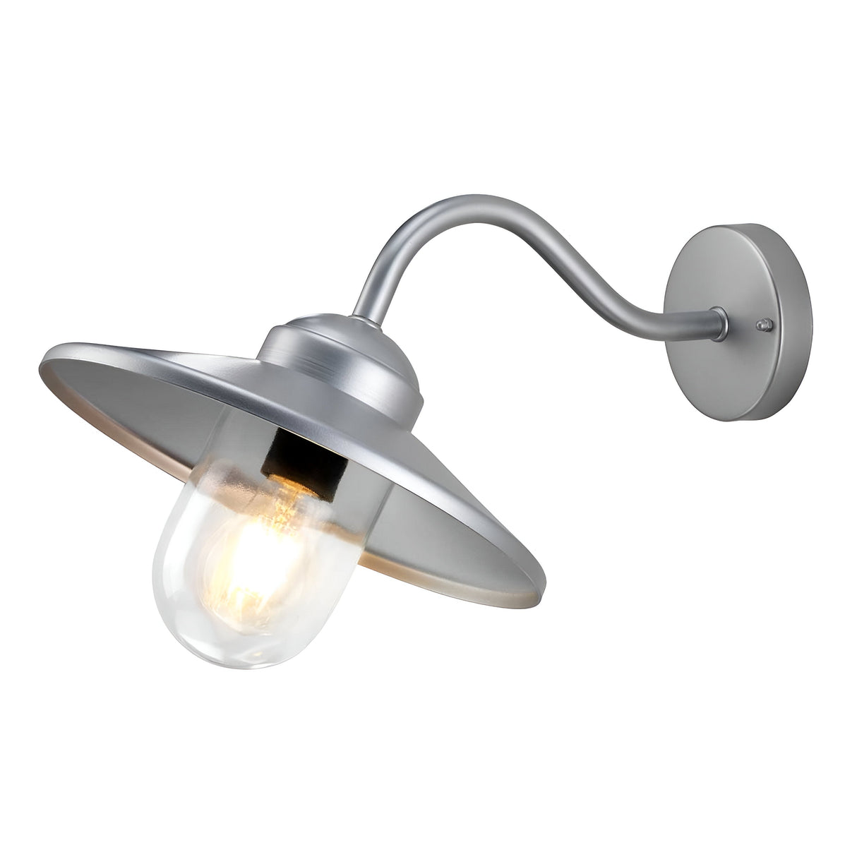 The Klampenborg 1 Light Outdoor Wall Light - Silver boasts a sleek wall-mounted silver fixture featuring a graceful, curved arm and a wide, rounded shade. Constructed from stainless steel, it includes a clear glass cover to shield the bulb while providing a warm glow. Its contemporary industrial design is enhanced by an IP44 rating for added durability.