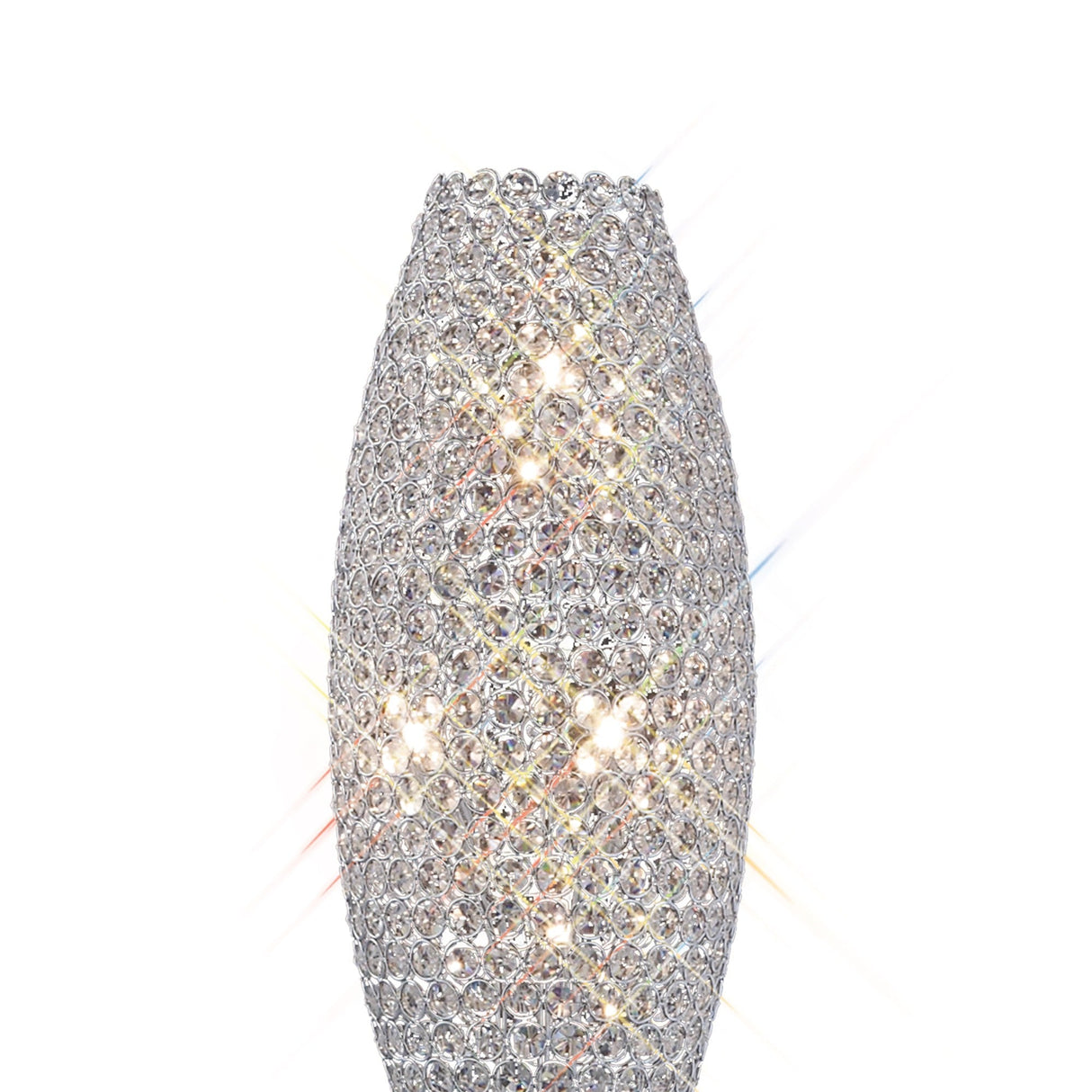 The Kos 4 Light Crystal Floor Lamp features a tall, oval-shaped design accented with sparkling crystals and a polished chrome finish, reflecting light beautifully in all directions against a white background.