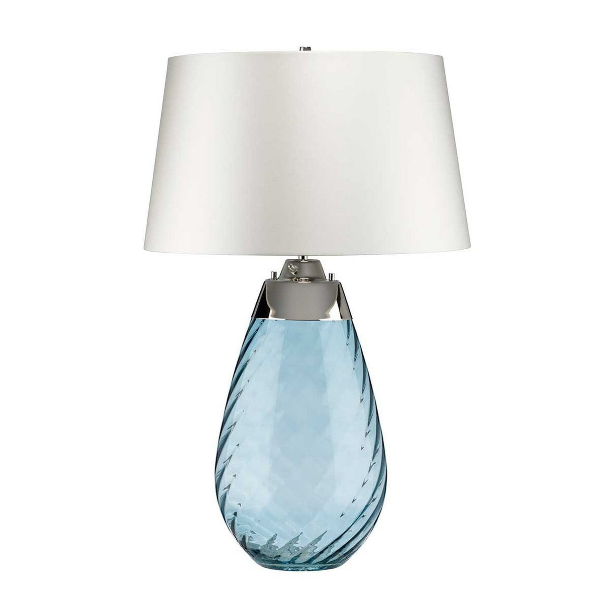 The Lena 2 Light Large Blue Table Lamp features a mouth-blown blue glass base with a delicate texture, paired with an off-white fabric shade and silver accents. Its modern design is further enhanced by the dual-light feature, providing both elegance and versatility.