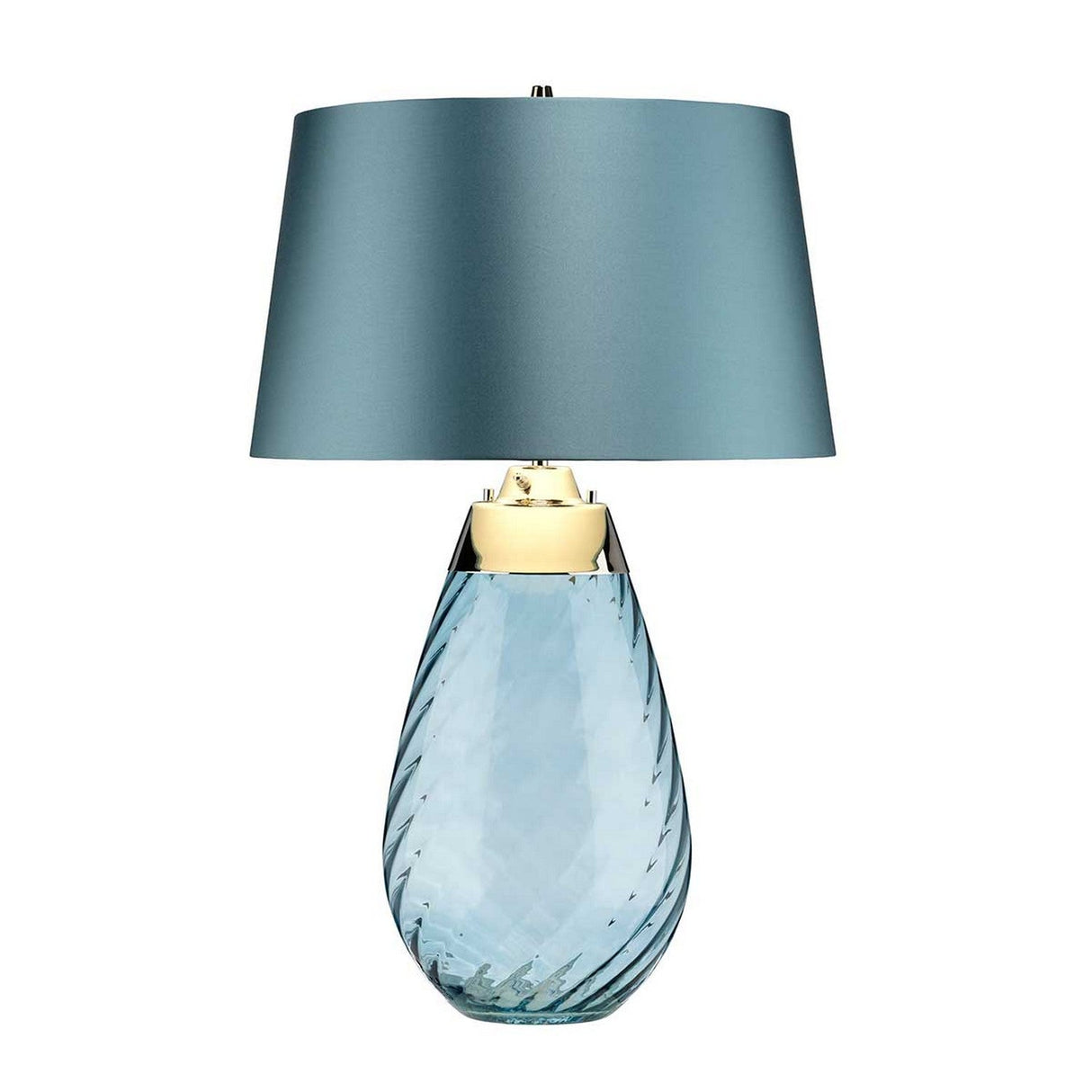 Introducing the Lena 2 Light Large Blue Table Lamp with a Duck Egg Blue Shade. This expertly handcrafted piece from the UK showcases a modern design with a textured transparent glass base and metallic blue shade. Accentuated by a gold detail at the top of its base, it offers a sleek and contemporary aesthetic. The addition of a 3-way switch adds versatility, making it both stylish and functional against any backdrop.
