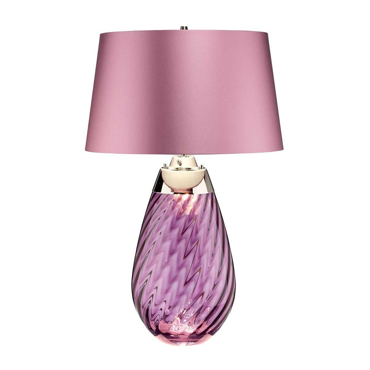 The Lena 2 Light Large Plum Table Lamp with a Heather Shade showcases a contemporary style with its pink shade and textured purple glass base. Crafted from swirled, glossy plum mouth-blown glass, the base offers a modern and elegant aesthetic.