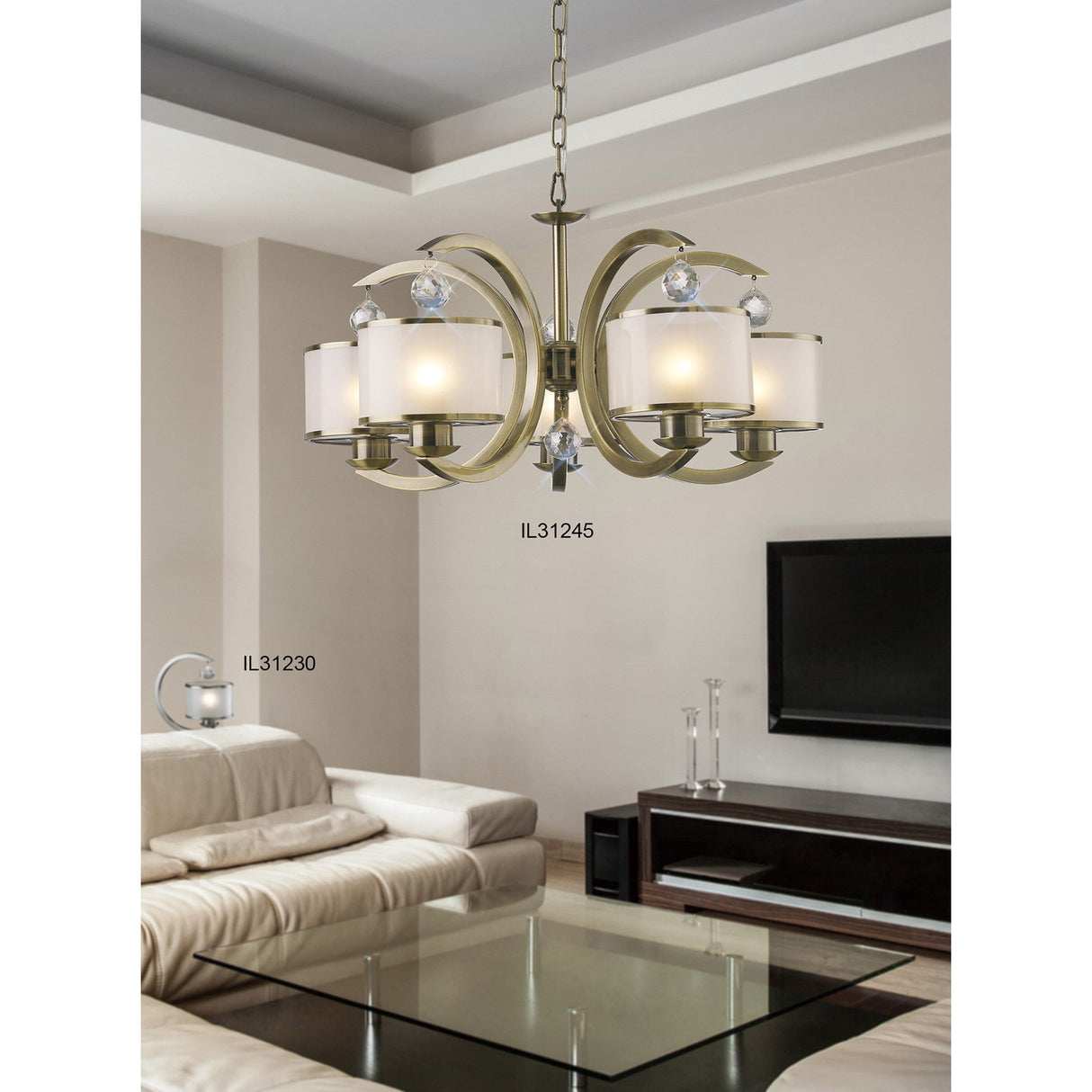 Modern living room featuring a beige sectional sofa, glass coffee table, wall-mounted TV, and the Lincoln 1 Light Crystal Table Lamp - Nickel with Glass Shade for a touch of contemporary elegance.