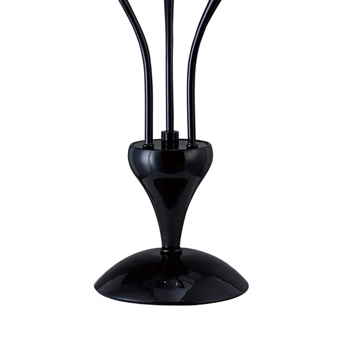 A close-up of the Llamas 3 Light Table Lamp in black features a shiny metal base with multiple thin arms, creating a sculptural and modern statement piece for any contemporary table setting.