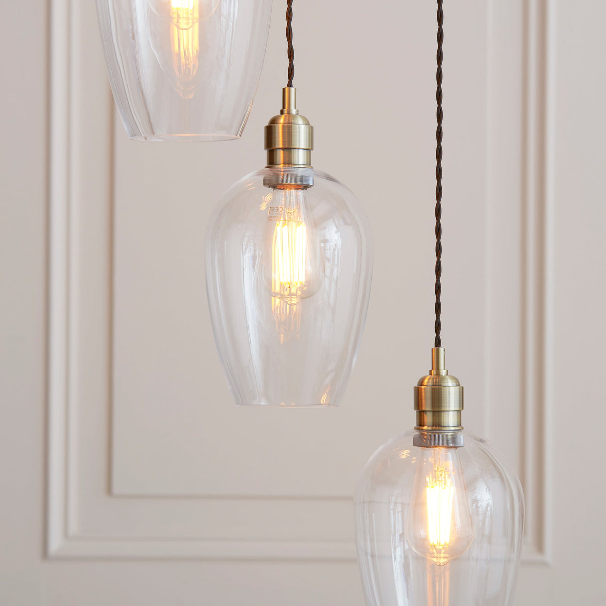 Quilbrook Cascade 7 Light Pendant - Antique Brass Clear