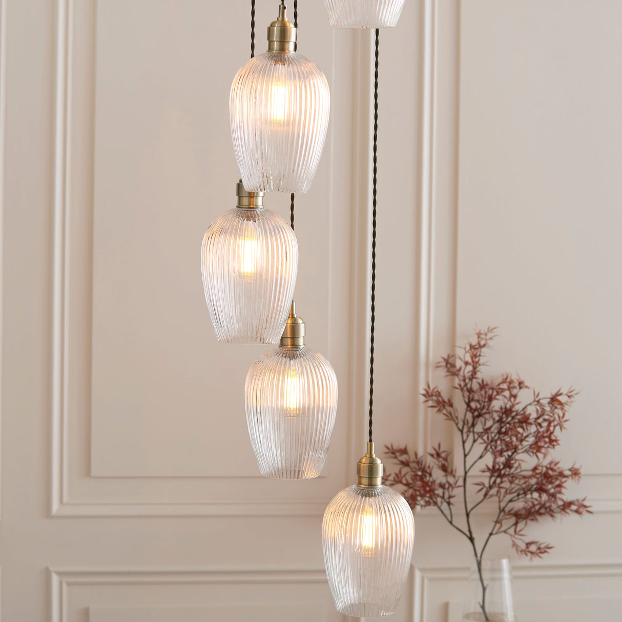 Fennhollow Ribbed Cascade 7 Light Pendant - Antique Brass Clear
