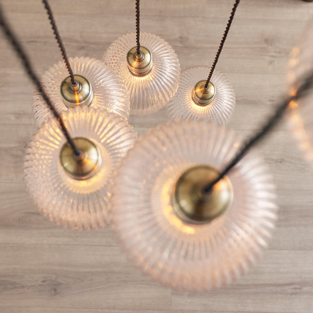 Fennhollow Ribbed Cascade 7 Light Pendant - Antique Brass Clear