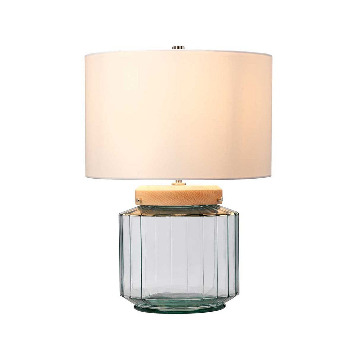 The Luga Table Lamp - Polished Nickel features a sleek modern design, highlighted by a cylindrical white fabric lampshade and a transparent, faceted glass base with wooden accents. Made from recycled materials, this lamp provides an eco-friendly element while casting a warm glow in any room.