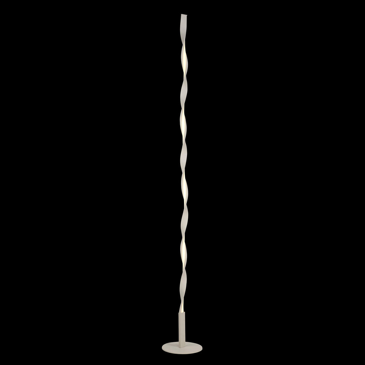 The Madagascar LED Floor Lamp 24W 3000K in Sand White features a tall, slender twisted design with a round base, offering soft white light for energy-efficient, sculptural elegance.