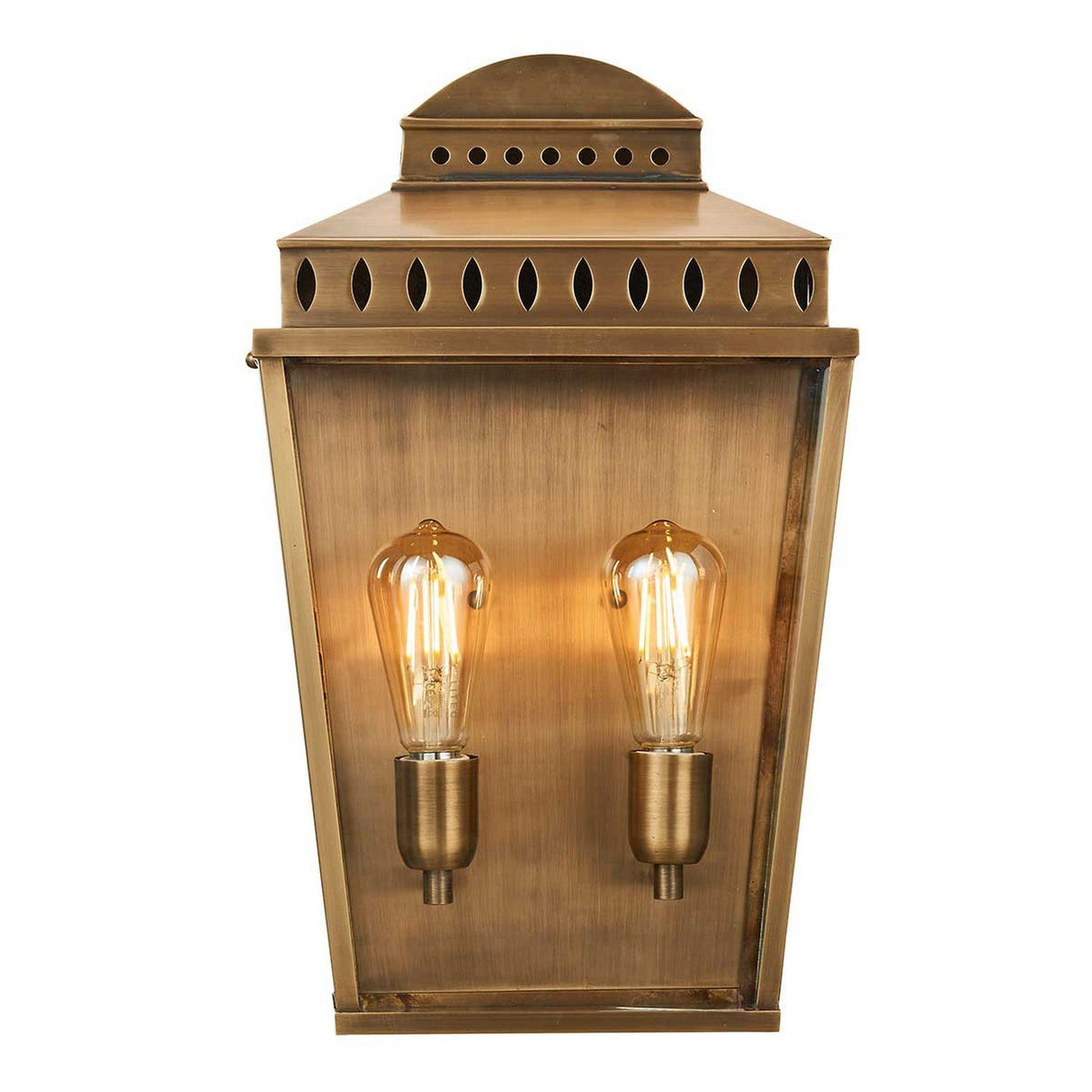 The Mansion 2 Light Outdoor Wall Light in aged brass boasts a vintage design with two exposed Edison bulbs, mounted on a rectangular backplate topped with decorative detailing. This solid brass lantern is IP44 rated, making it both durable for outdoor use and perfect for casting a warm glow.