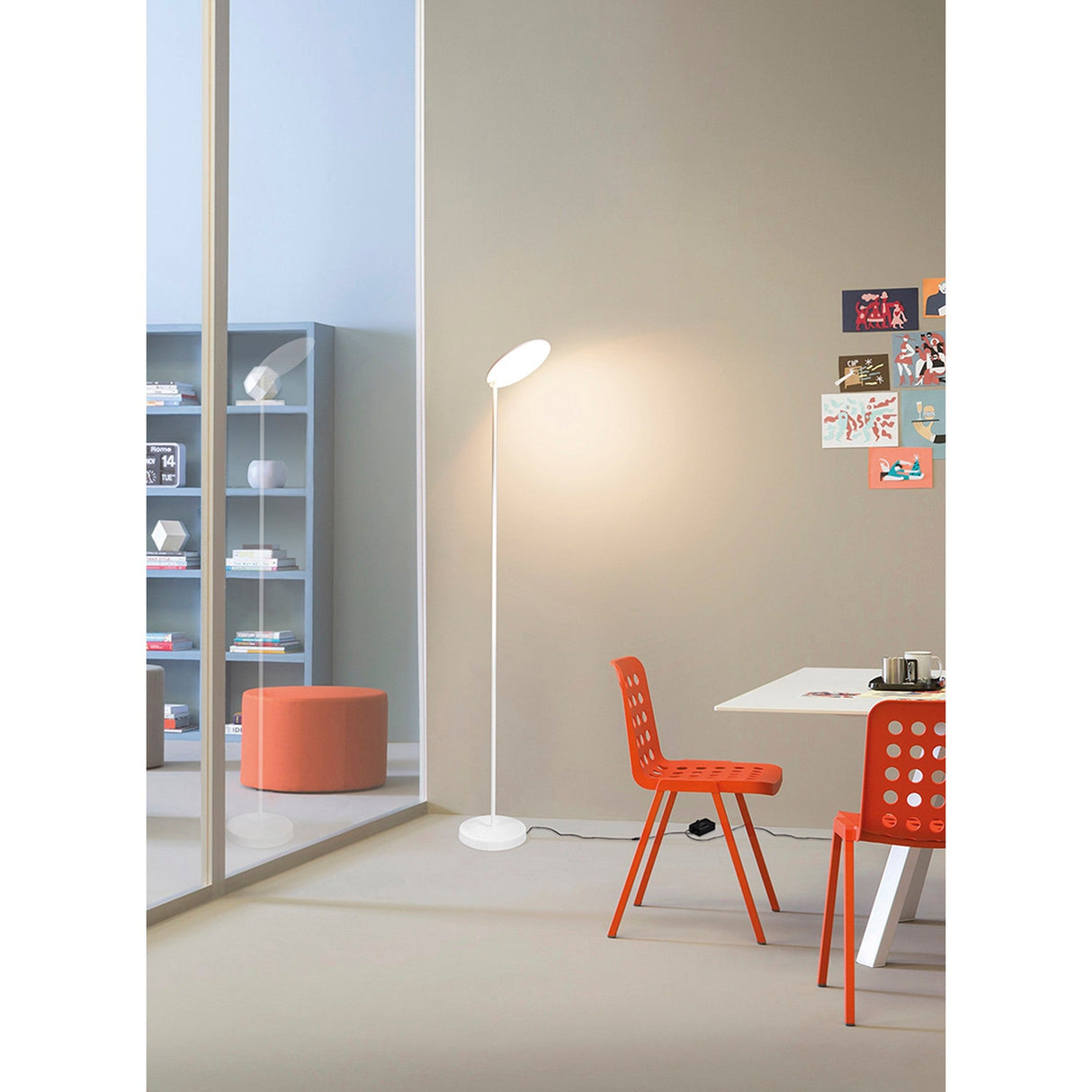 A room with a table and chairs, softly illuminated by the Nassau Dimmable LED Floor Lamp 30W 3000K in white.