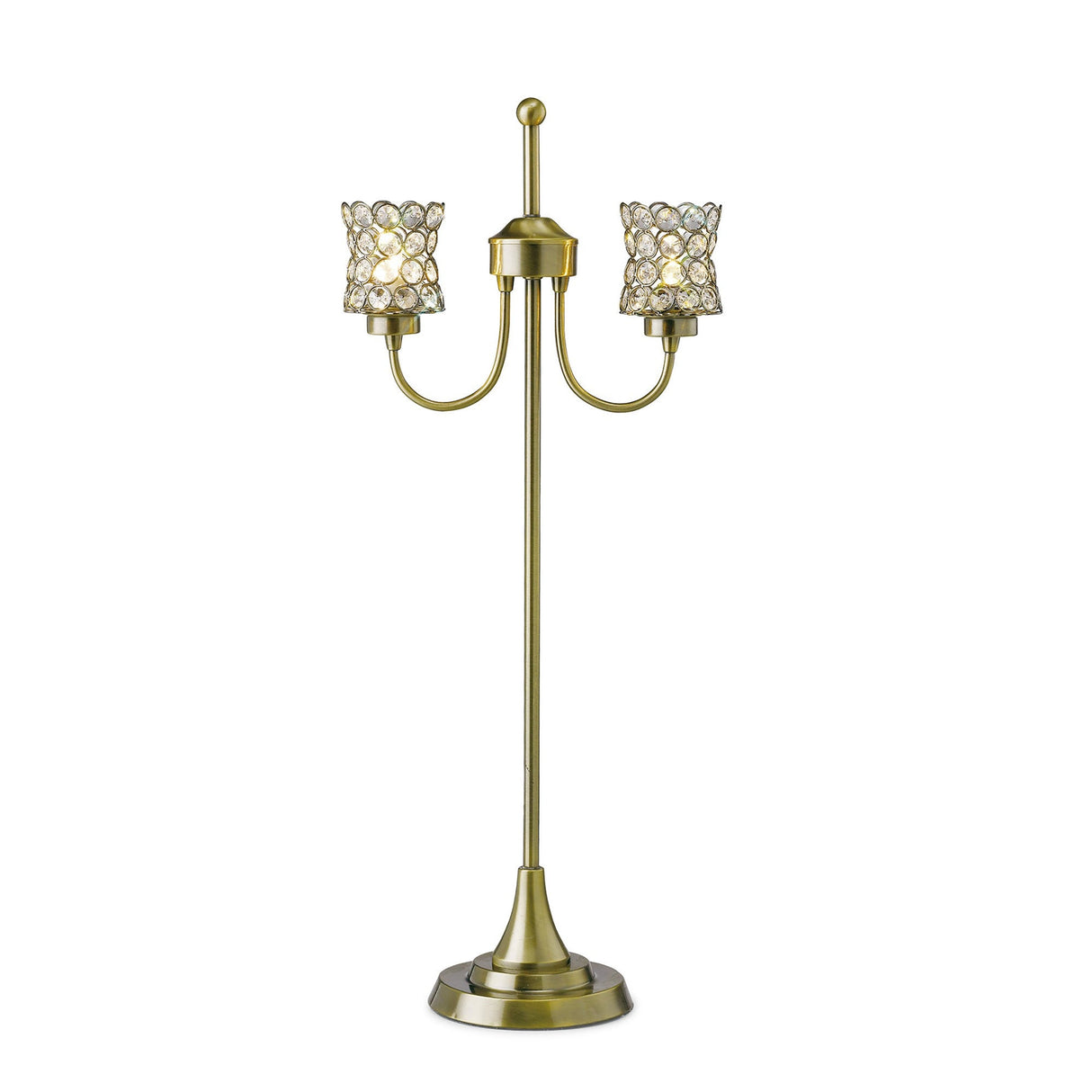 The Nelson 2 Light Crystal Table Lamp in antique brass features double arms with two ornate, crystal-embellished shades on a round base, shown upright against a white background.