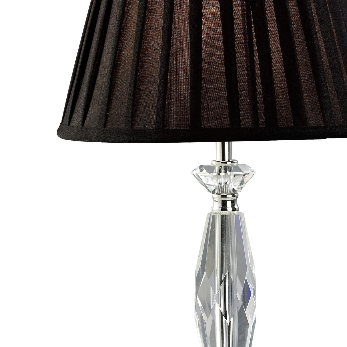 A close-up of the Nexon 1 Light Crystal Table Lamp, featuring a black pleated lampshade and faceted crystal base with silver metallic accents.
