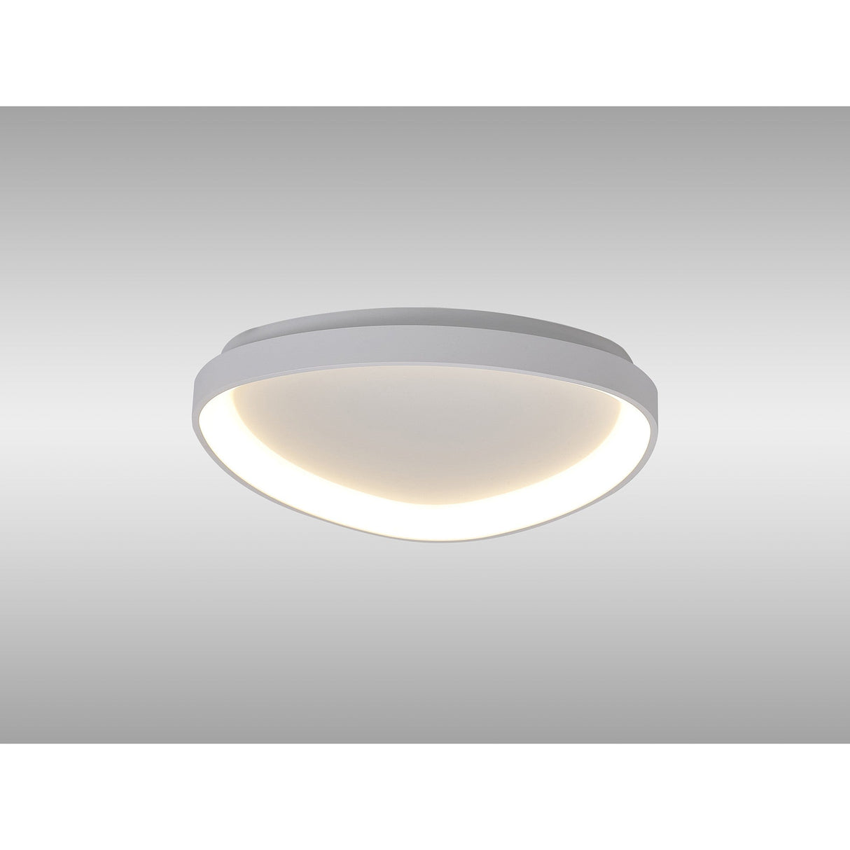 Mantra Niseko triangular flush ceiling light with integrated LED inner band and white powder-coated metal frame, shown mounted on a plain ceiling.