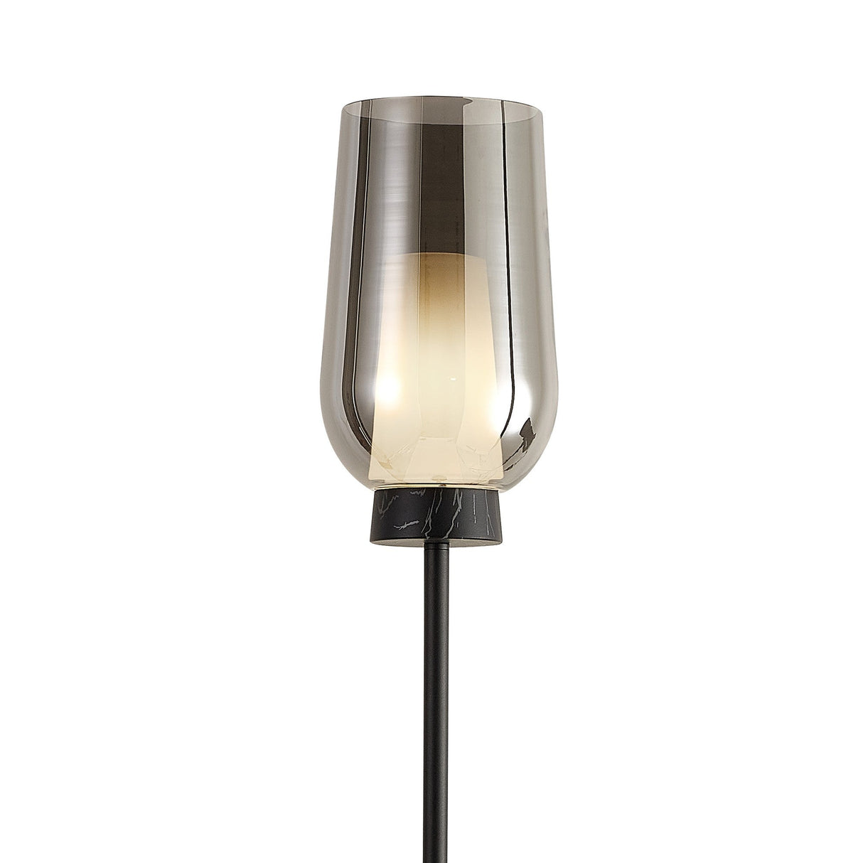 The Nora 1 Light Chrome Glass Floor Lamp features a tall, cylindrical smoked glass shade and a black marble base, creating a modern look with a soft, warm glow.