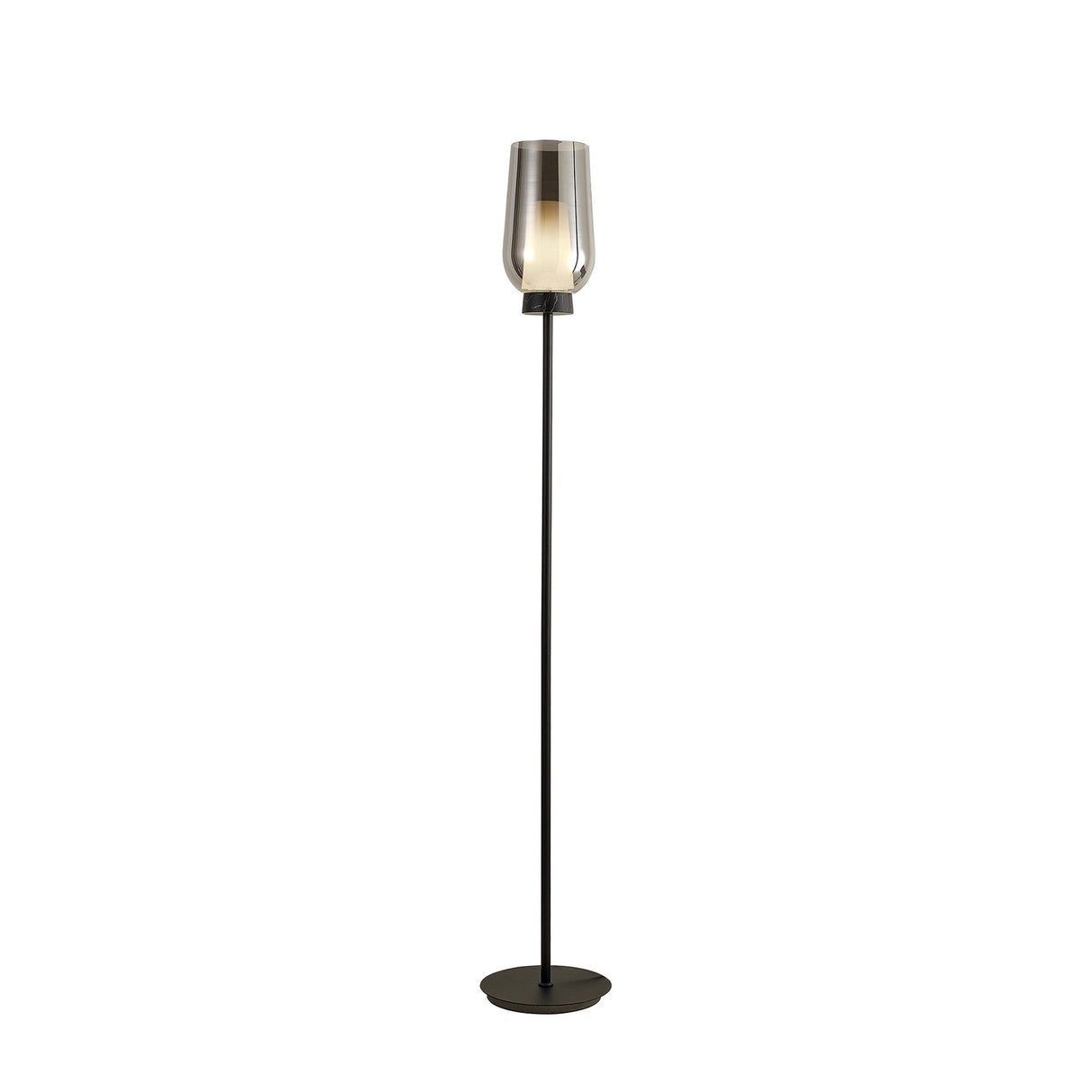 The Nora 1 Light Chrome Glass Floor Lamp features a slim black stand, a black marble base, and a cylindrical glass shade surrounding the bulb, all set against a plain white background.