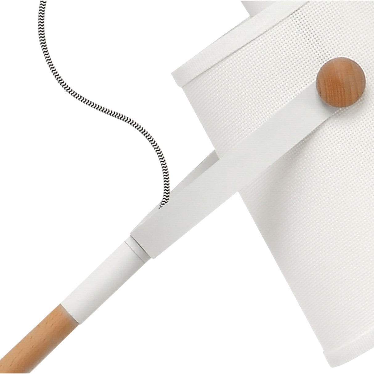 Close-up of the Nordica 1 Light Floor Lamp in matt white with an ivory white shade, featuring a wooden accent and metal arm. A black-and-white striped cord appears in the background.