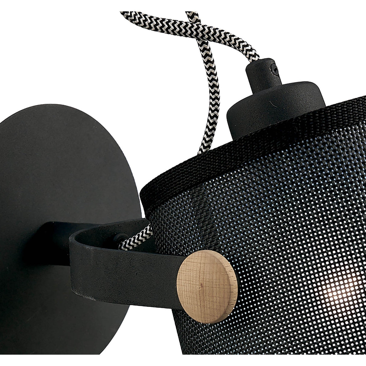 Close-up of Mantra Nordica wall spotlight showing matt black mesh cylindrical shade, beech wood pivot detail, and braided black-and-white fabric cable.