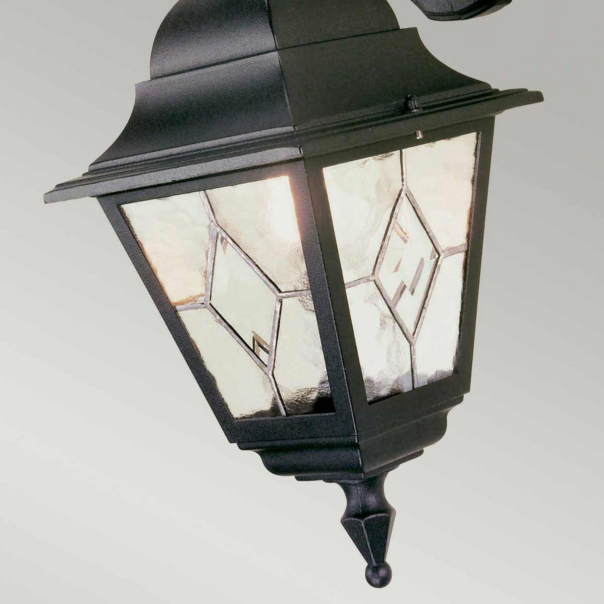 The Norfolk 1 Light Outdoor Down Wall Light - Black features hand-leaded glass panels with diamond shapes and a traditional design, mounted on a wall bracket.