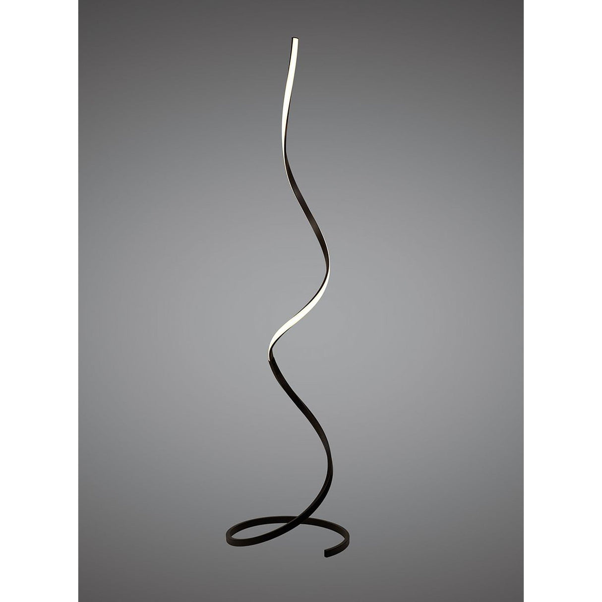 The Nur Blanco XL Dimmable LED Floor Lamp 20W 2800K in Brown Oxide features a sleek, ribbon-like design that loops at the base and twists upward—ideal for ambient lighting in modern interiors, showcased against a plain gray background.