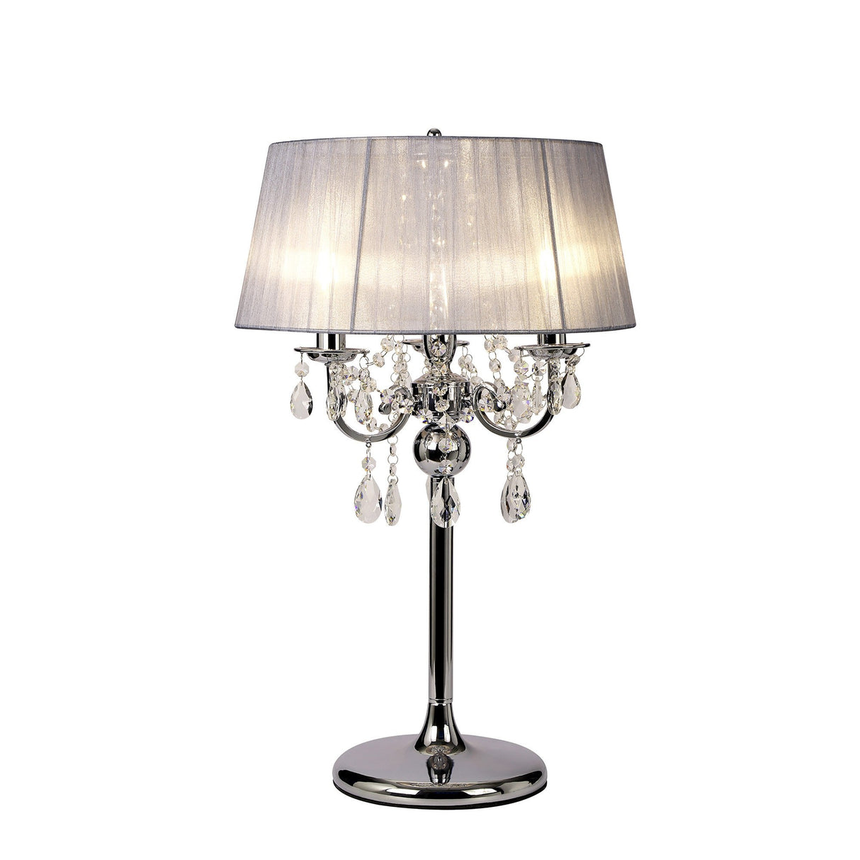 The Olivia 3 Light Crystal Table Lamp features a polished chrome base, elegant hanging crystal accents, and a sleek grey shade, providing warm ambient lighting when turned on.