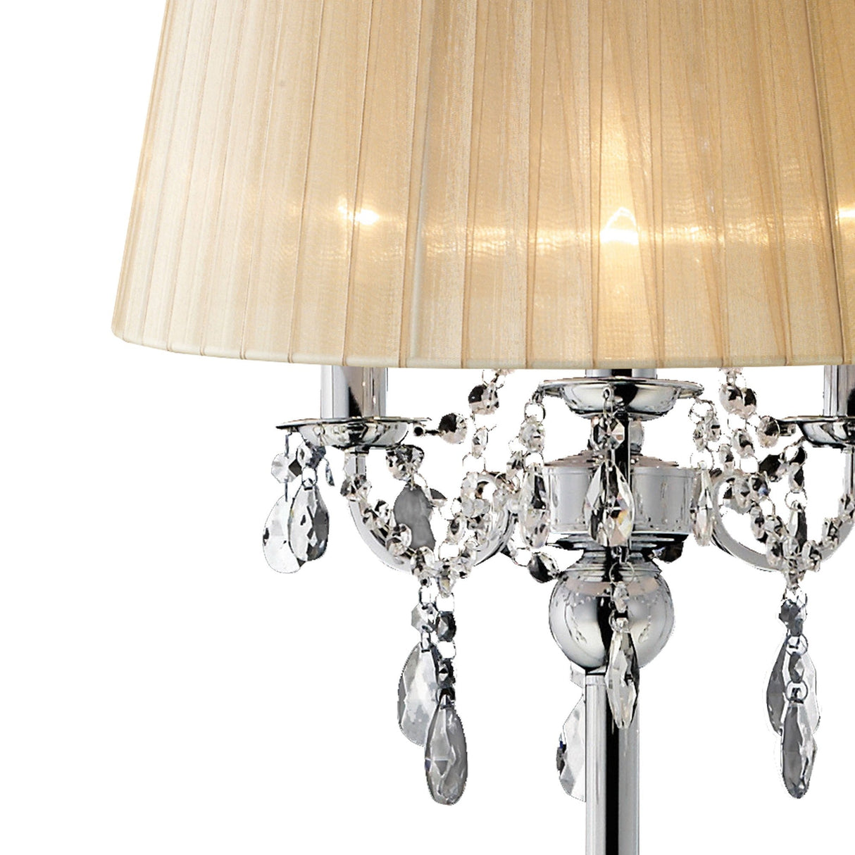 A close-up of the Olivia 3 Light Crystal Floor Lamp in chrome with a bronze pleated shade and ornate crystal decorations. The dimmable lamp is lit, casting a warm glow from its shiny metallic base.