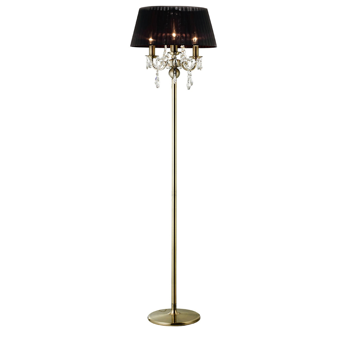 The Olivia 3 Light Crystal Floor Lamp features a tall, modern design with a brass finish, black pleated shade, round base, and three candle-style bulbs adorned with hanging crystal ornaments.
