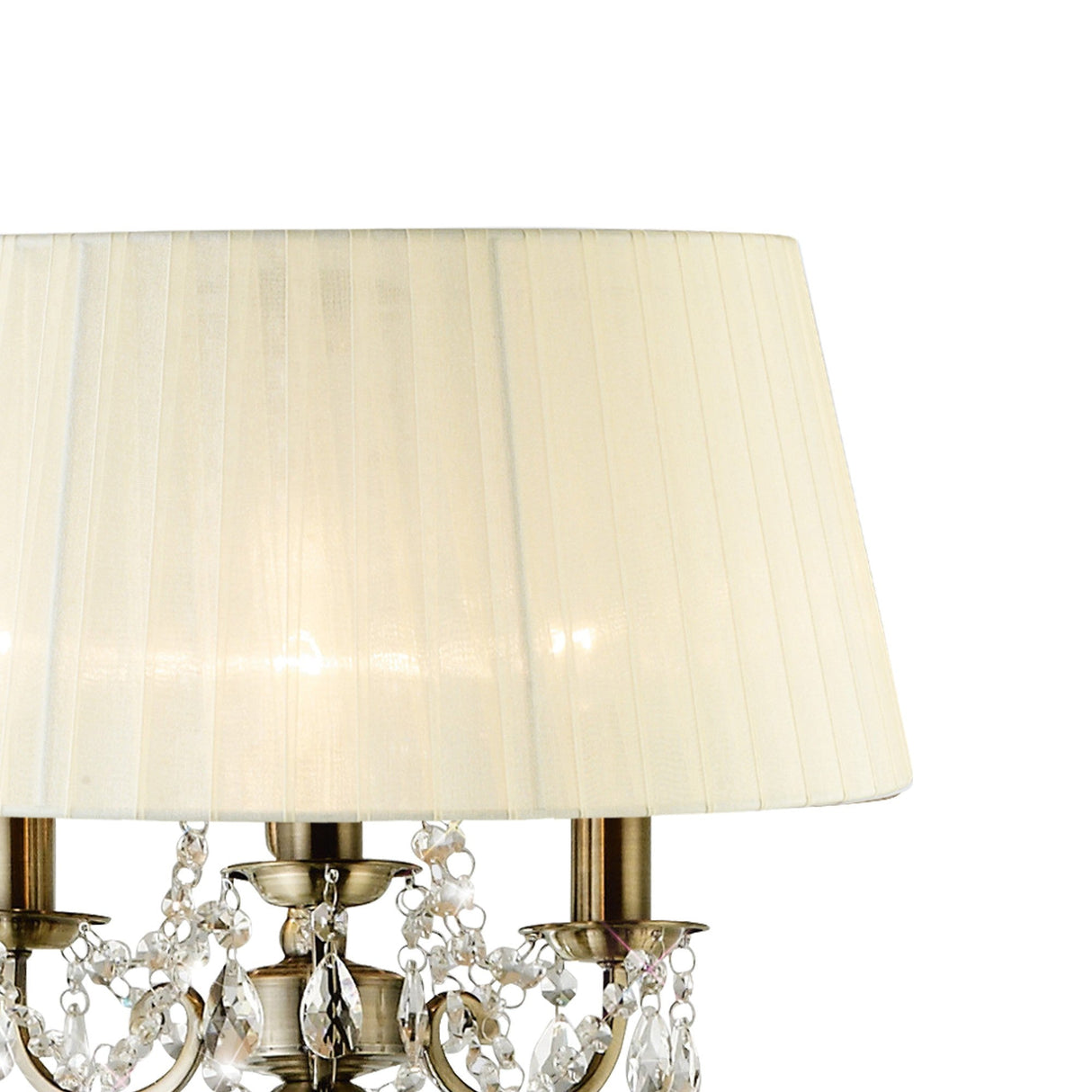 The Olivia 3 Light Crystal Floor Lamp features a brass finish, crystal accents, and a pleated cream shade, shown here in close-up against a plain white background.