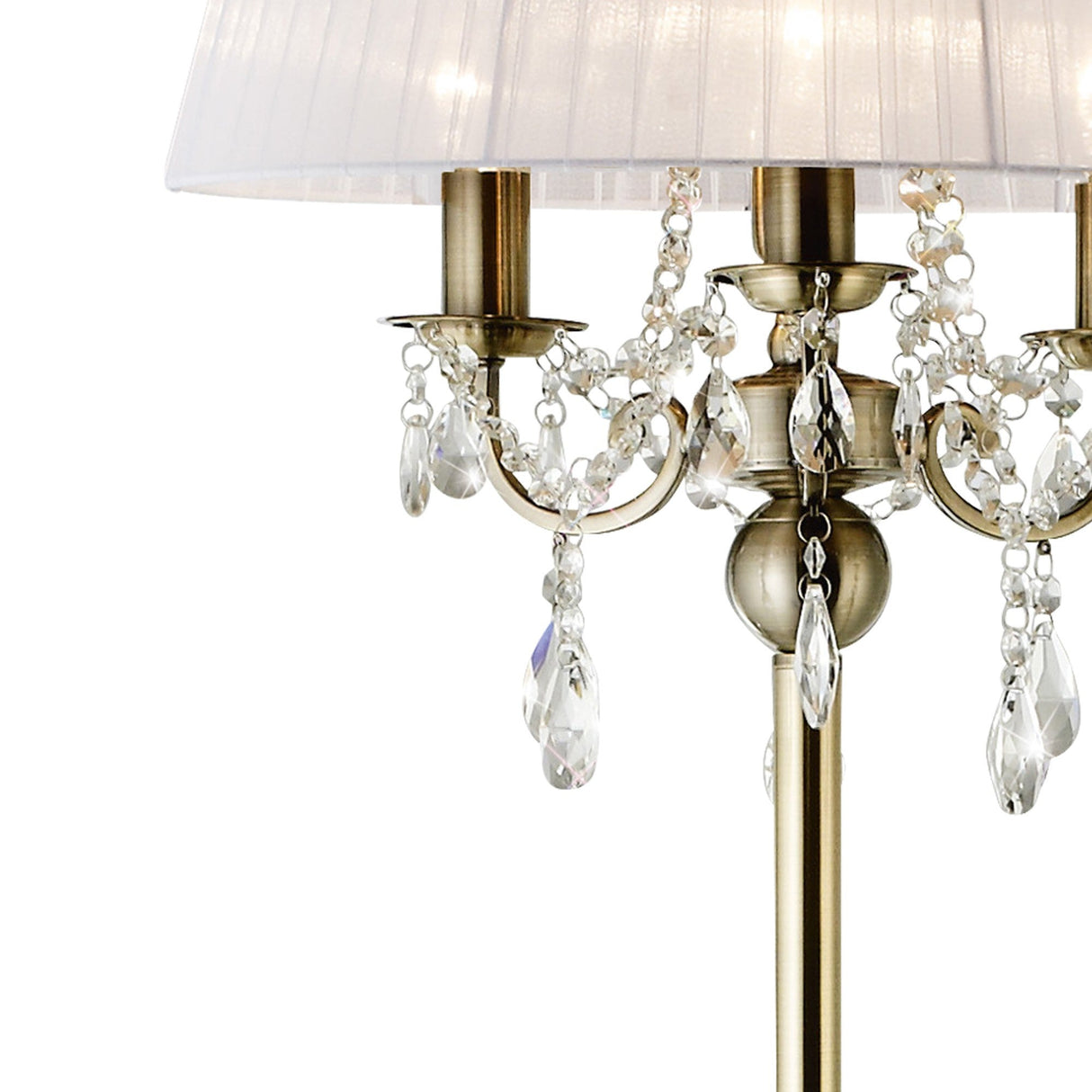 Close-up of the Olivia 3 Light Crystal Floor Lamp in brass with a white shade, featuring ornate arms and hanging crystal pendants for a luxurious, classic touch.