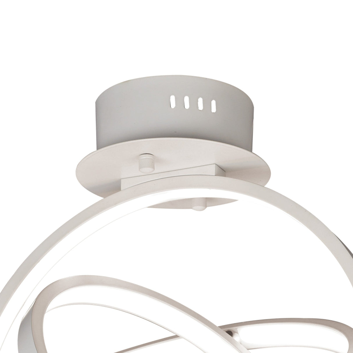 Close-up of the Mantra Orbital LED semi-flush ceiling light's matt white cylindrical mount and ceiling plate, with interlocking aluminium rings below.
