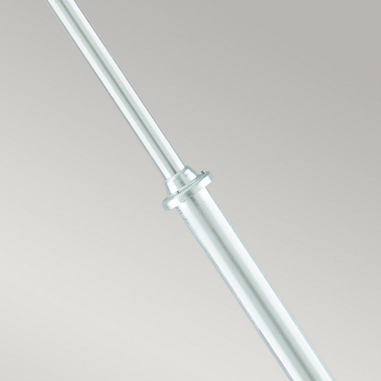 An Oslo 2 Light Lamp Post in silver stands against a plain gray background, showcasing its sleek design and smooth finish.