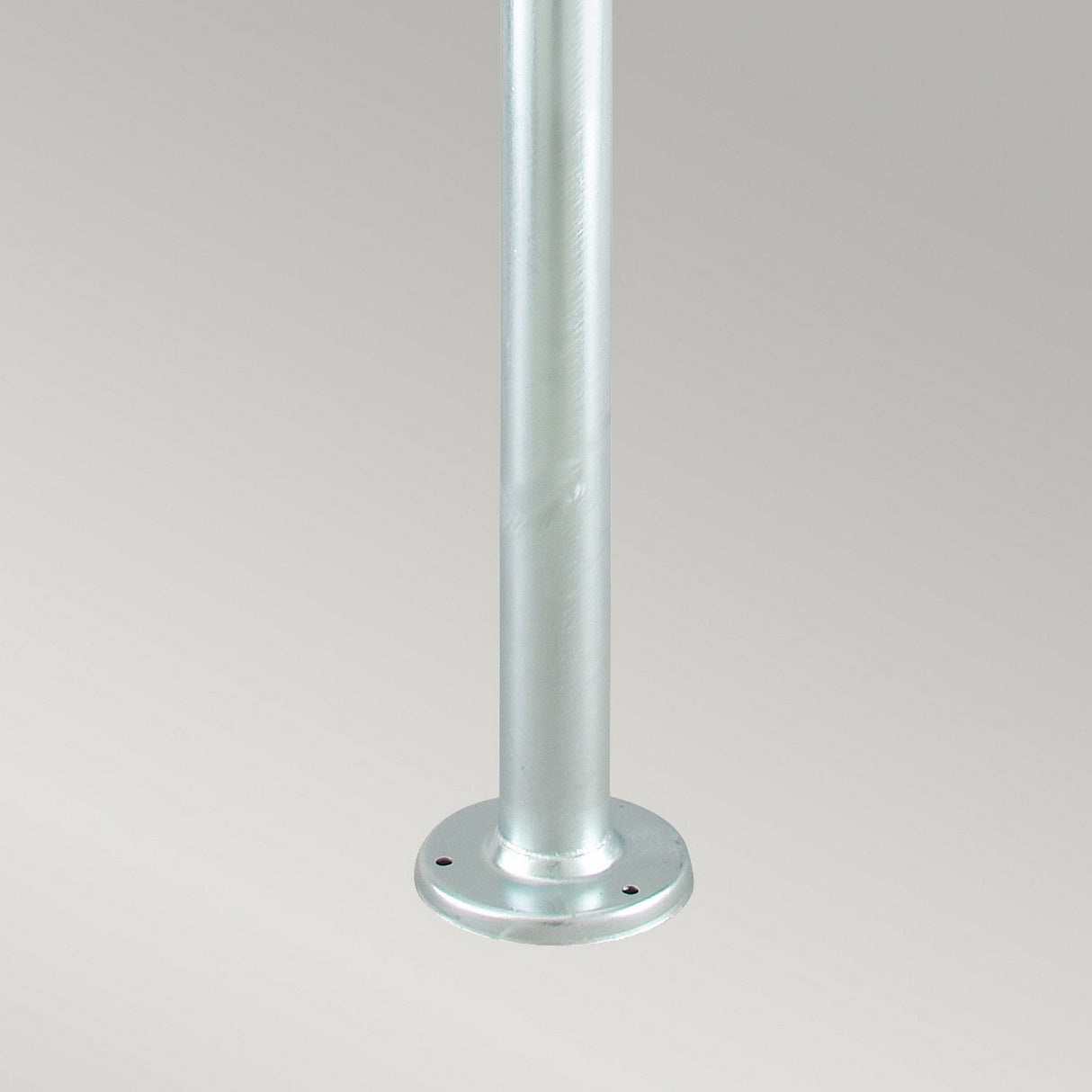 The Oslo 2 Light Lamp Post - Silver features a metal pole with a circular base, constructed from galvanized steel for enhanced durability and designed specifically for mounting. It is ideal for outdoor lighting, boasting an IP55 rating. The background is a simple, light gray.