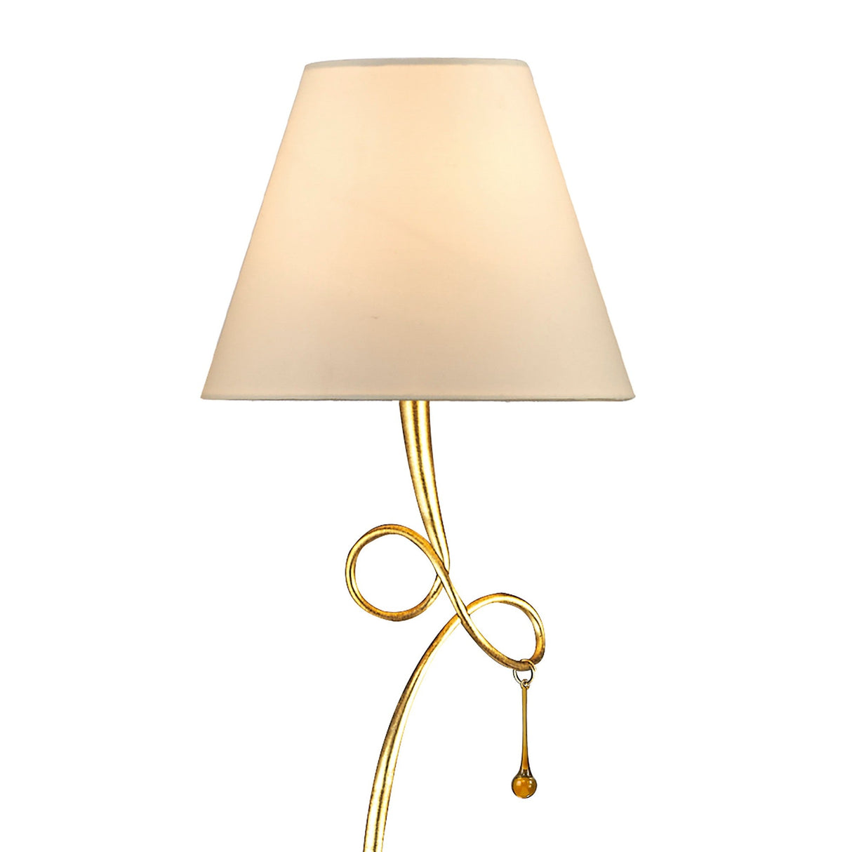 The Paola 1 Light Floor Lamp features a gold finish, a cream shade, and an elegantly curved stand forming a loop, adorned with delicate glass droplets.