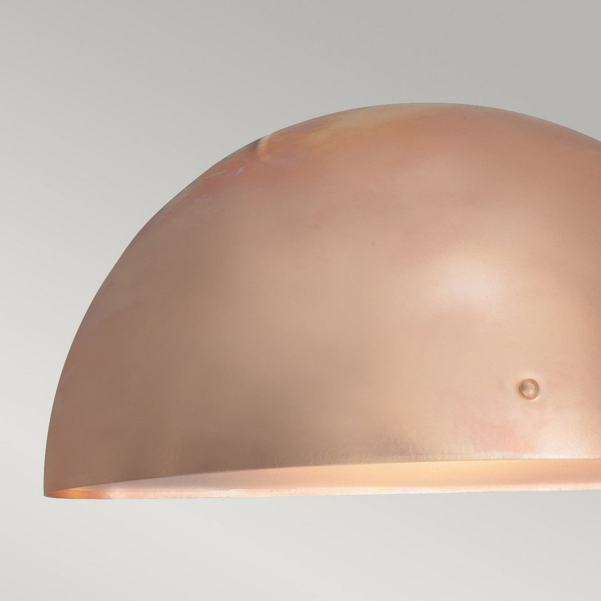 Close-up of a dome-shaped Paris Outdoor Large 1 Light Wall Lantern in copper against a plain background. The metallic surface has a soft sheen, showcasing its smooth and minimalistic design. Perfect for outdoor lighting, this elegantly crafted fixture is IP43 rated for durability.