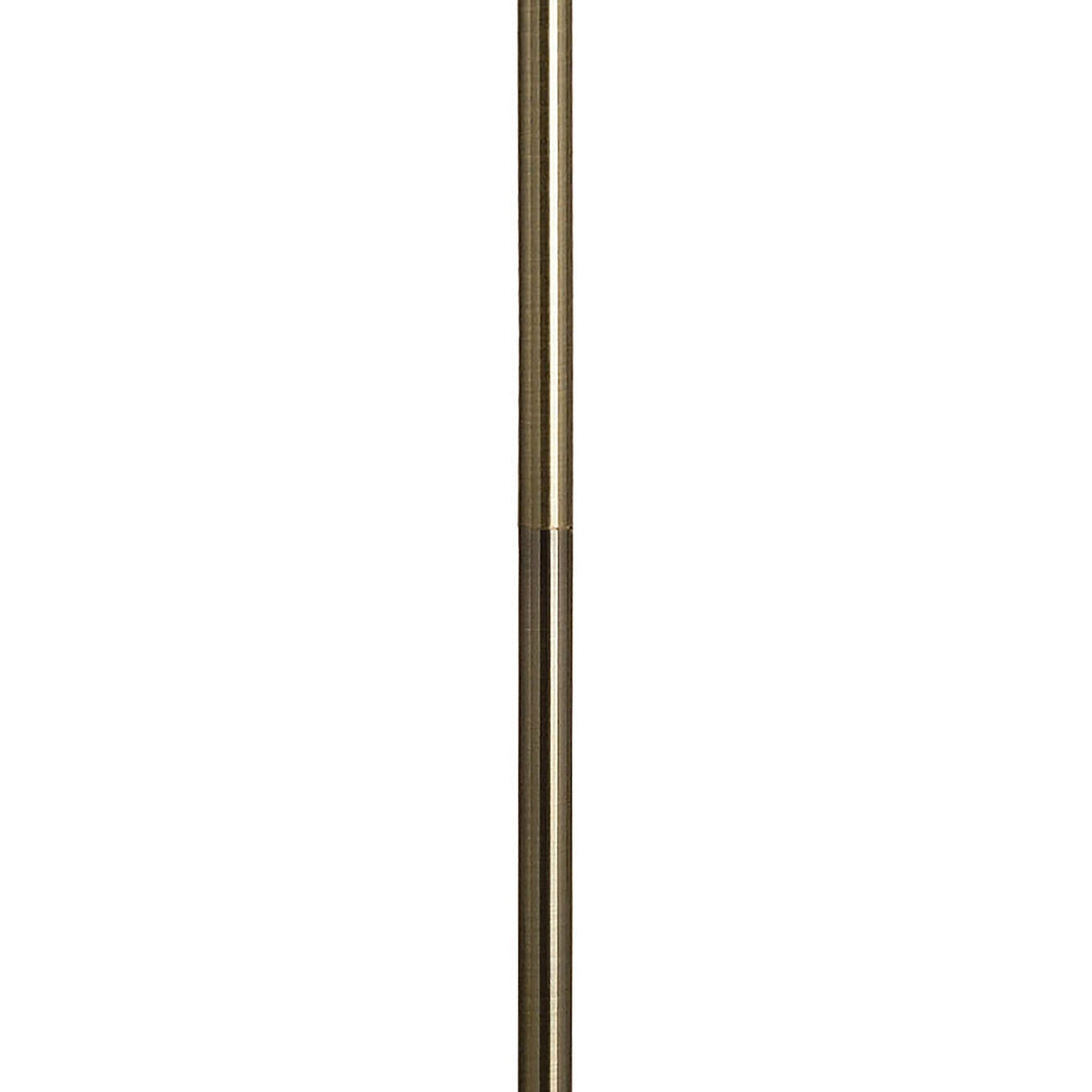 The Pietra 4 Light Floor Lamp in Antique Brass features a tall, slender design with a circular base and adjustable arm holding a white cone-shaped shade—ideal decorative statement lighting for any room.