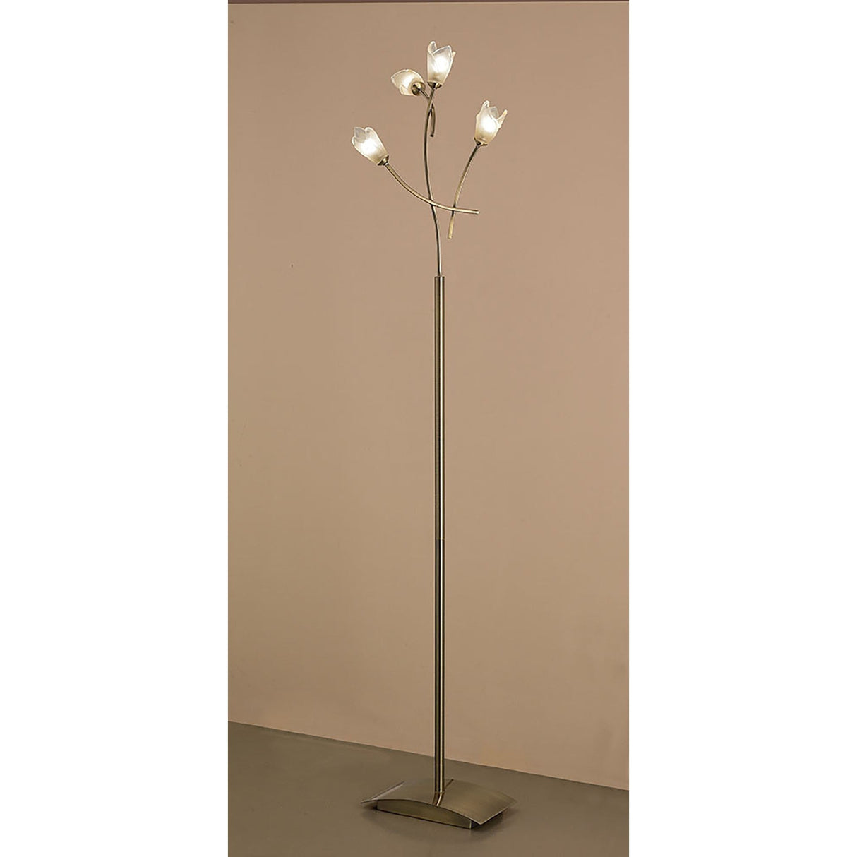 The Pietra 4 Light Floor Lamp in antique brass features illuminated lights, creating a stylish and decorative statement in any room.