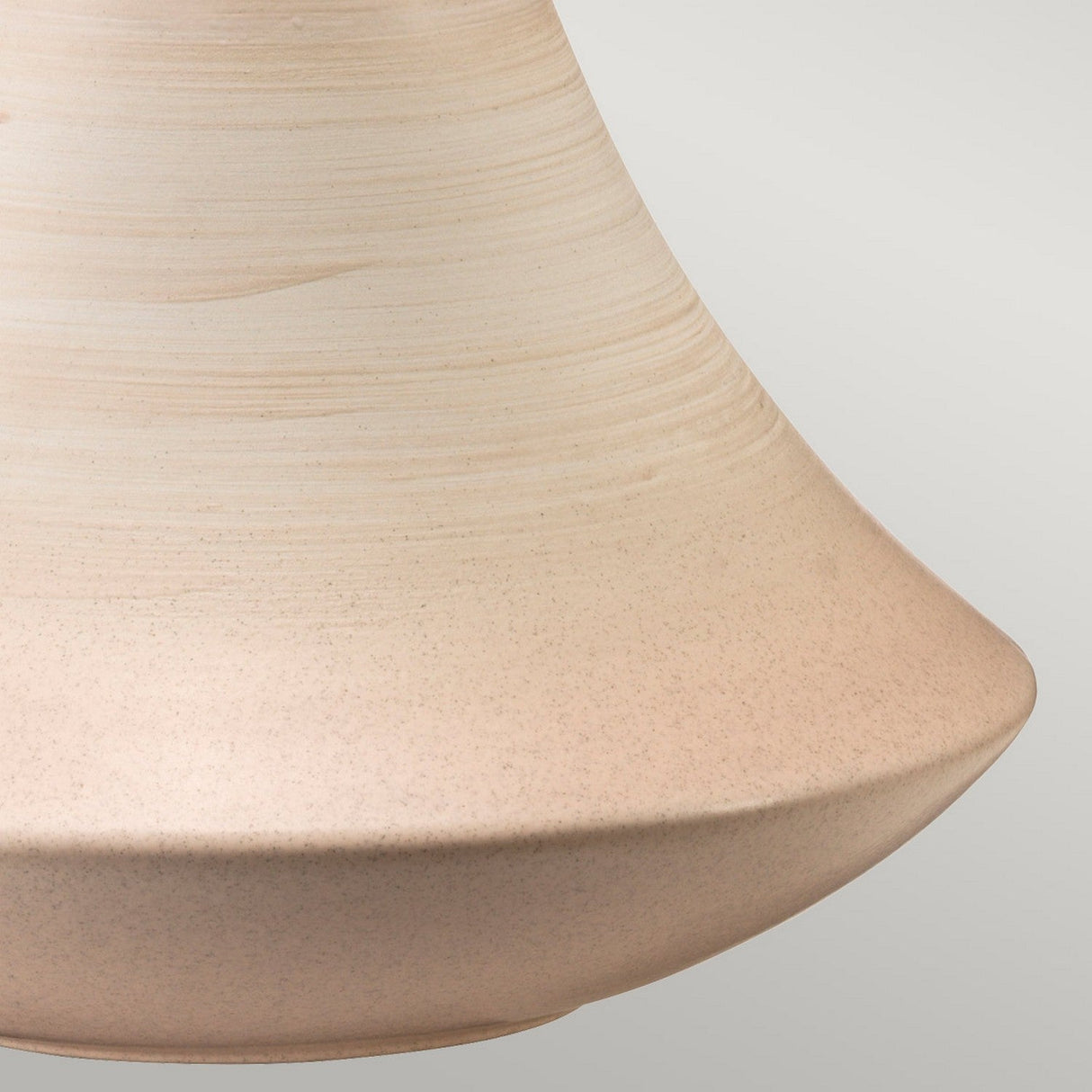 Close-up of the ceramic vase base with subtle horizontal textures and a smooth, wide rim, reminiscent of the refined design seen in the Pinner 1 Light Table Lamp - Subtle Pink & Matt Cream. The background is a plain, light gray.