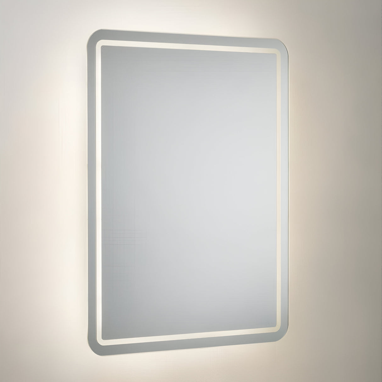 A 60x45cm backlit LED bathroom mirror with a contemporary design, featuring an integrated LED light strip around its edges and a convenient motion sensor for hands-free operation, mounted on a plain wall. It also includes a demister function and shaver socket for added functionality.