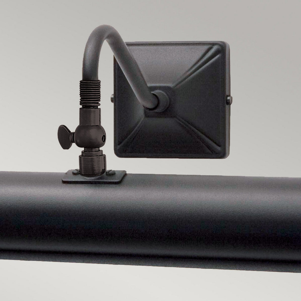 Close-up of the Picture Light 2 Light Large - Black, showcasing its vintage-style design with adjustable lighting and arm. It features a square backplate and a cylindrical shade, ideal for illuminating artwork or enhancing decor.