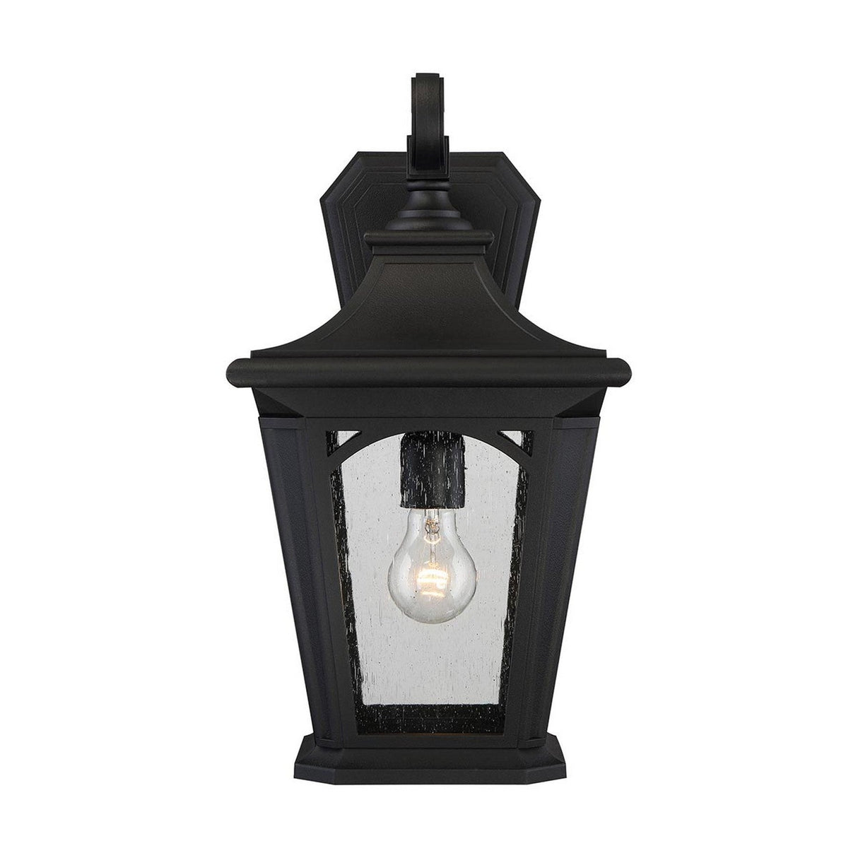 The Bedford Outdoor 1 Light Large Wall Lantern in black is a weather-resistant fixture with a classic design, showcasing a rectangular shape and clear glass panel. The visible bulb inside adds vintage charm, elegantly displayed against a plain white background.
