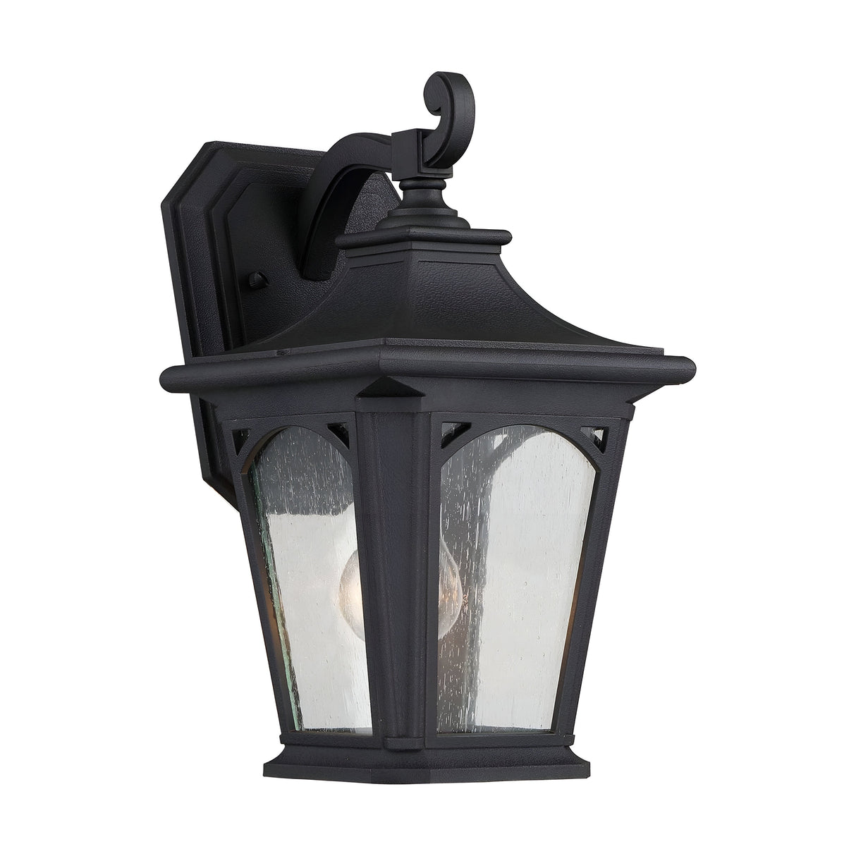 The Bedford Outdoor 1 Light Small Wall Lantern features a black, vintage lighting design with clear glass panels and a decorative hook at the top, all attached to a square mounting plate. Crafted from durable composite material, it seamlessly combines classic style with modern resilience.