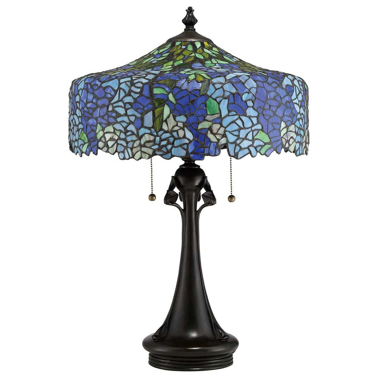 The Cobalt 3 Light Tiffany Table Lamp - Vintage Bronze features a mosaic shade in blue and green hues, reminiscent of a hydrangea pattern. With its ornate base and two pull chains, the design elegantly showcases floral patterns for a timeless, sophisticated look.