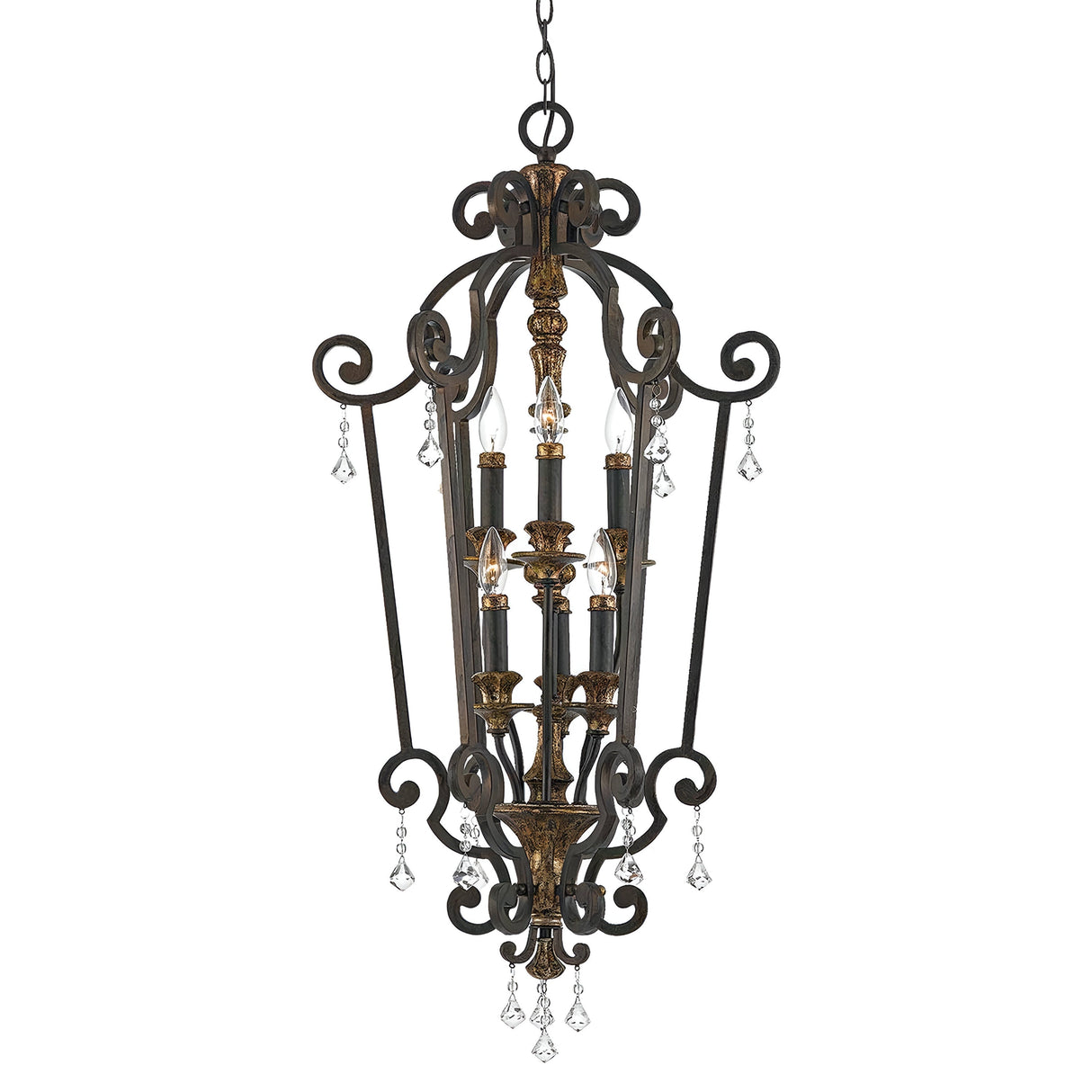 The Marquette-B 6 Light Chandelier in bronze showcases an ornate design with elegant scrollwork and crystal drops. This vintage-style fixture features a wrought iron construction and multiple candle-style lights at its center.