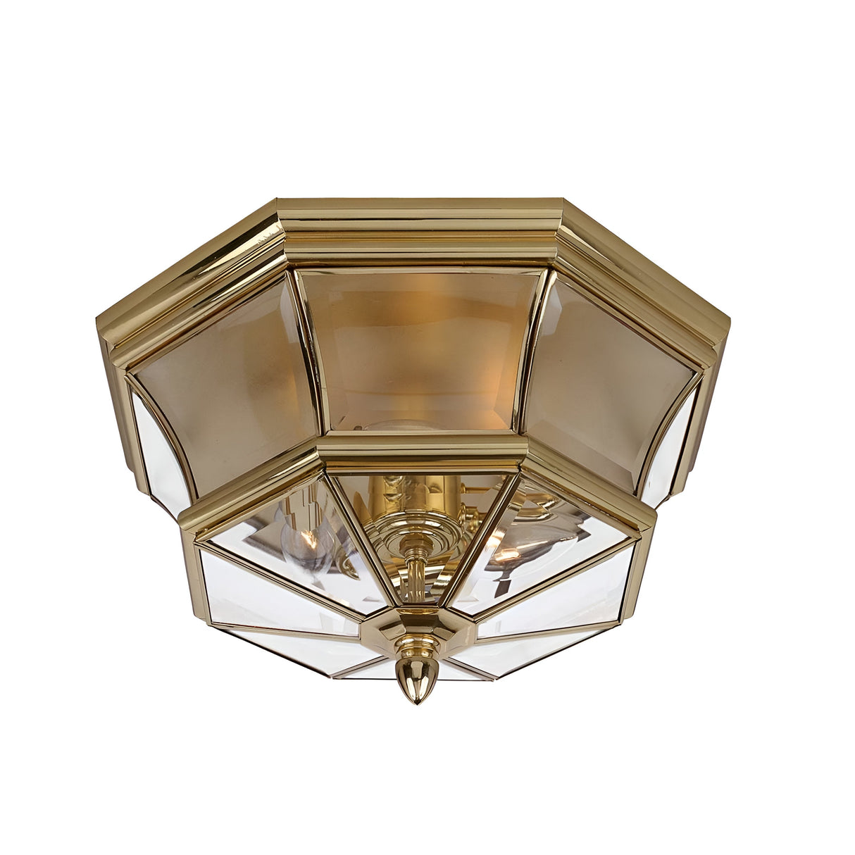 The Newbury Outdoor 3 Light Flush in Lacquered Polished Brass is an elegant and geometric flush-mount fixture with an octagonal design. It features clear glass panels and a decorative finial at the bottom center, making it ideal for traditional interiors.