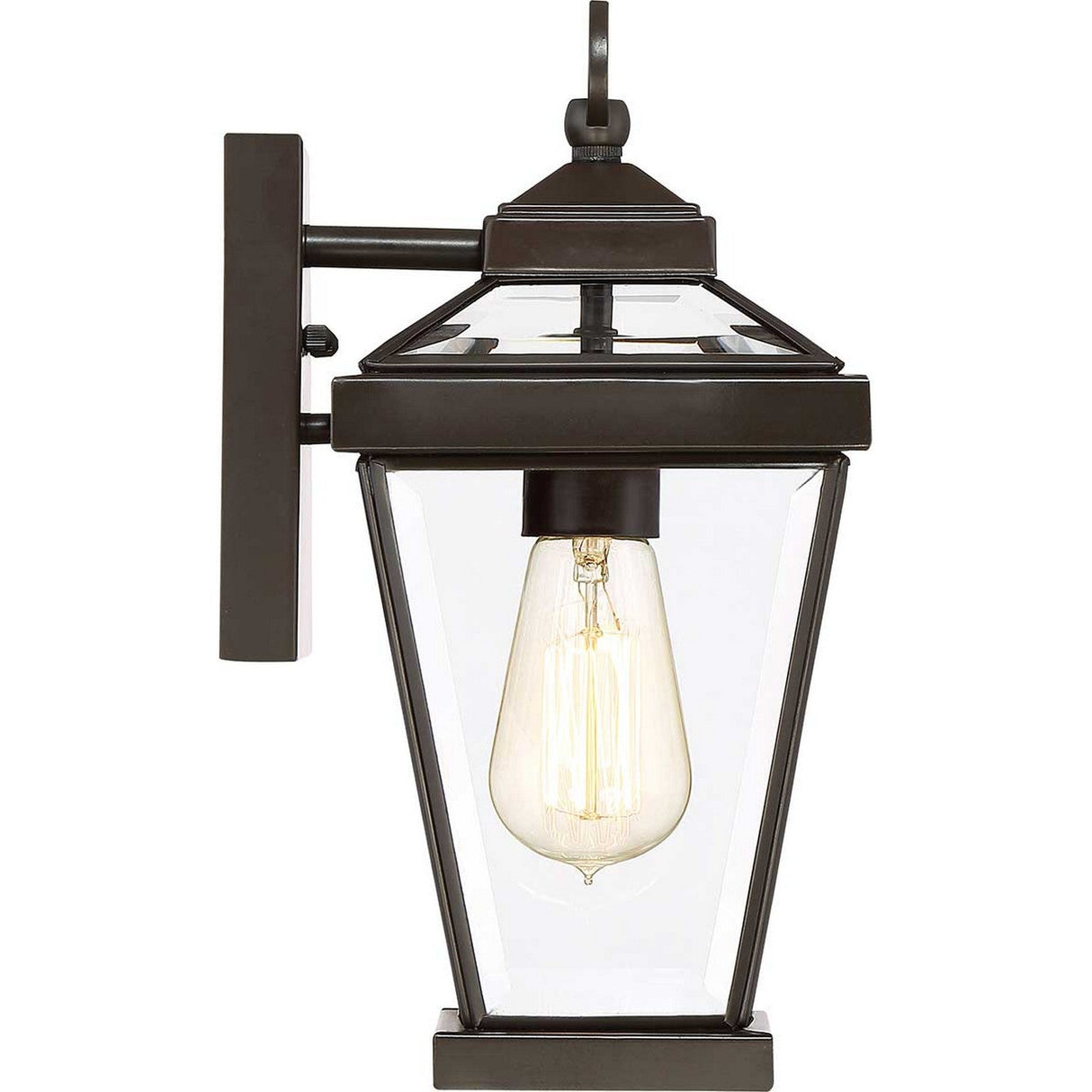 Introducing the Ravine Outdoor Small Wall Lantern in Western Bronze, which features a black metal frame and clear glass panels. This vintage-style wall lantern showcases a visible Edison bulb, elegantly suspended from a short arm with a rectangular base for convenient wall mounting, making it an ideal choice to elevate your outdoor decor.