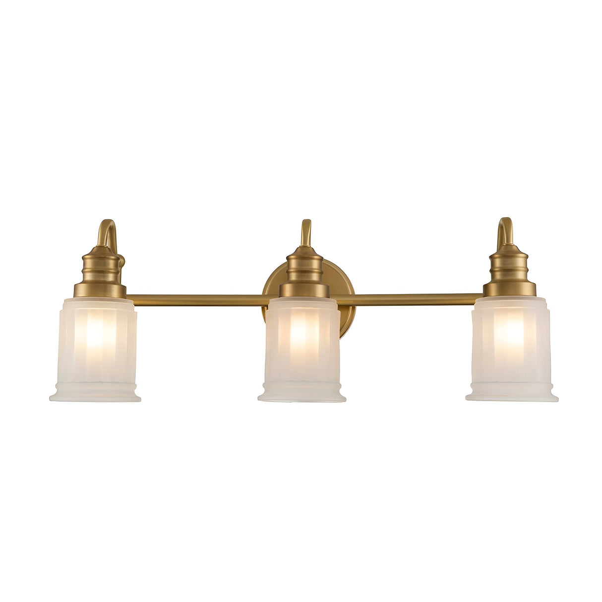 The Swell 3 Light Wall Light in brushed brass features a classic and elegant design, perfect for any sophisticated space. It includes three LED G9 bulbs with frosted glass shades, mounted on a horizontal bar that's connected to a circular wall plate.