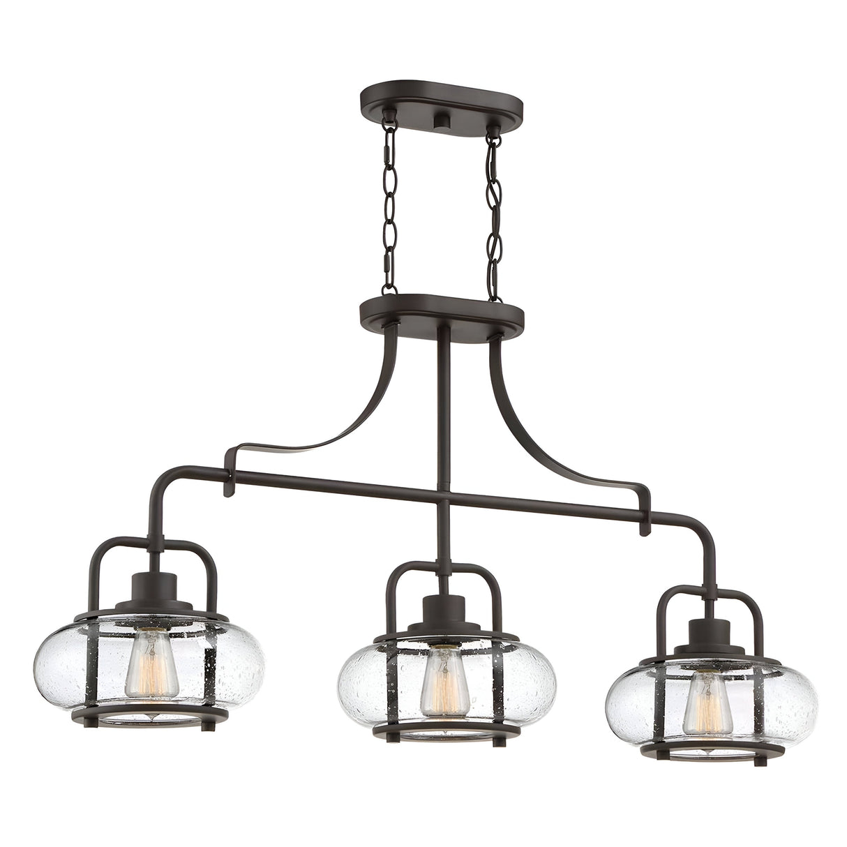 The Trilogy 3 Light Island Light in Olde Bronze features a modern industrial design with three round clear glass lampshades. Enhanced by LED filament bulbs, its curved metal arms provide an elegant and contemporary appearance.