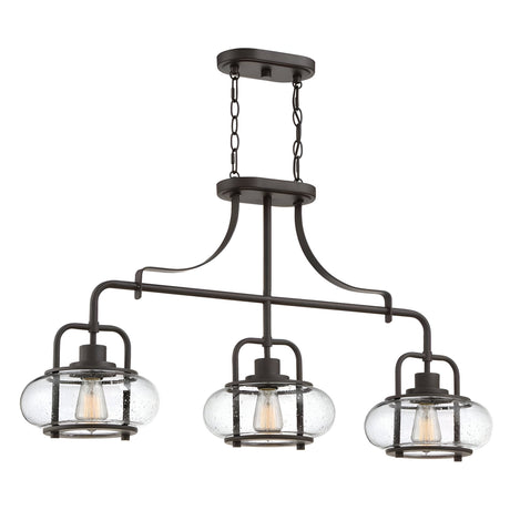 The Trilogy 3 Light Island Light in Olde Bronze features a modern industrial design with three round clear glass lampshades. Enhanced by LED filament bulbs, its curved metal arms provide an elegant and contemporary appearance.