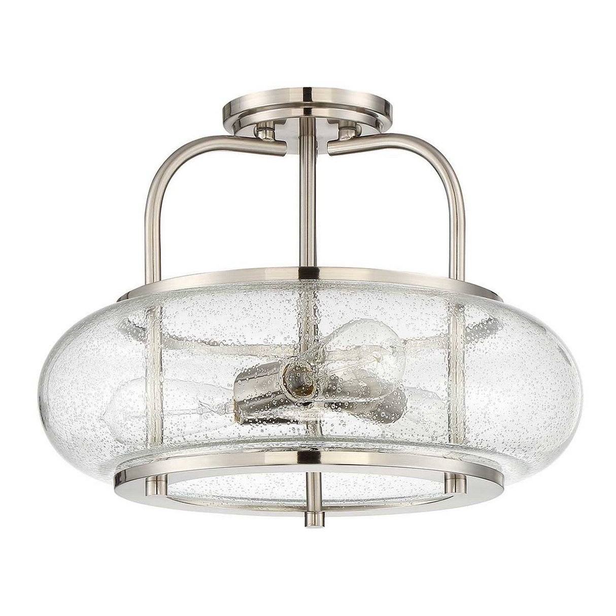 Introducing the Trilogy 3 Light Semi-Flush in a brushed nickel finish, featuring LED filament bulbs. This modern ceiling light fixture boasts a circular frame with three elegant curved supports and is adorned with a large, clear seeded glass shade that encases the bulbs, combining style with energy efficiency.