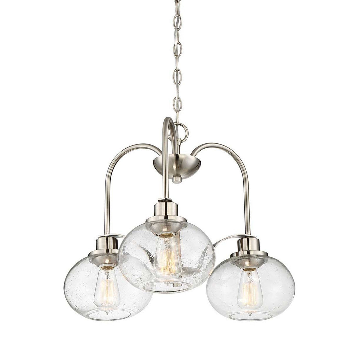 The Trilogy 3 Light Chandelier in brushed nickel features a modern design with three clear glass globe shades and visible filament bulbs. Suspended from a chain, this semi-flush fixture is ideal for contemporary home decor.