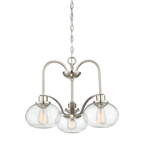The Trilogy 3 Light Chandelier features a brushed nickel finish and a sleek metal frame, showcasing three globe-shaped seeded glass shades, each housing a bulb and suspended elegantly from a chain for a contemporary touch that complements diverse interior styles.